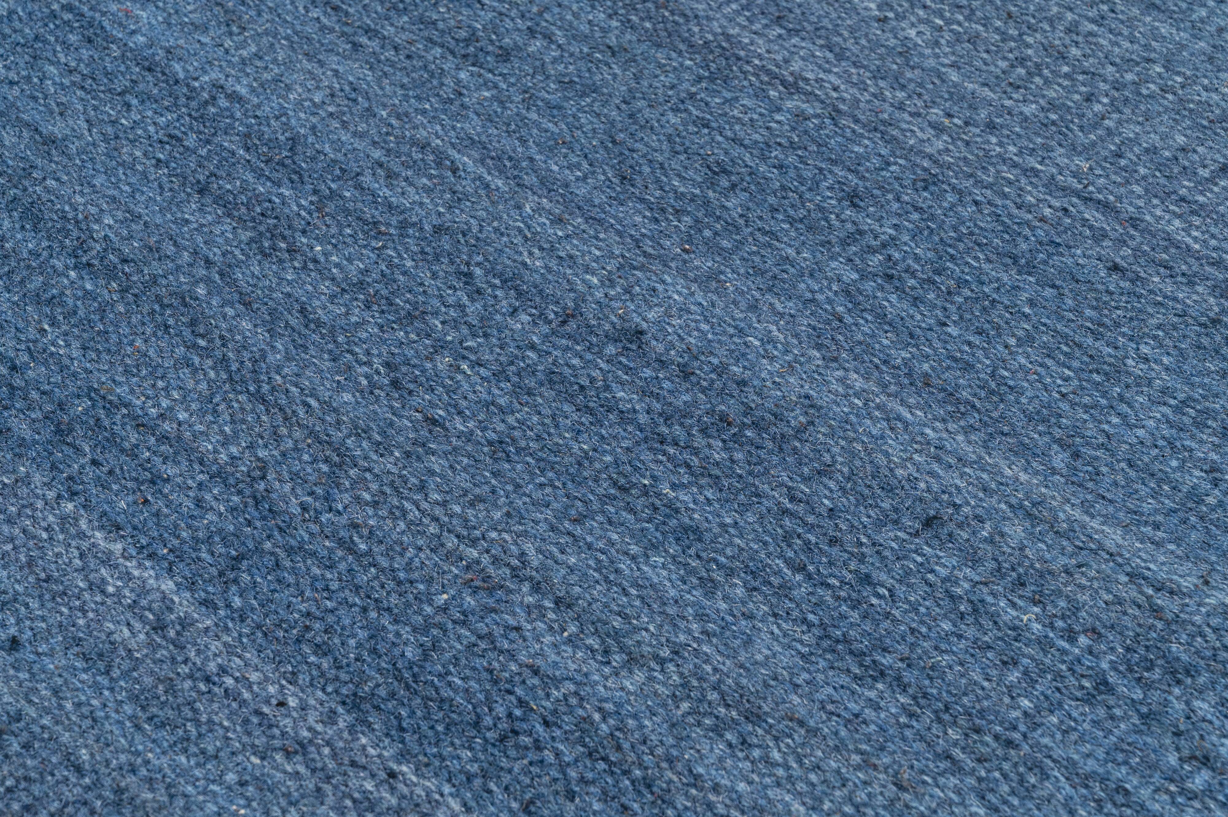 Scandinavian style minimalist flat weave rug. A small one.