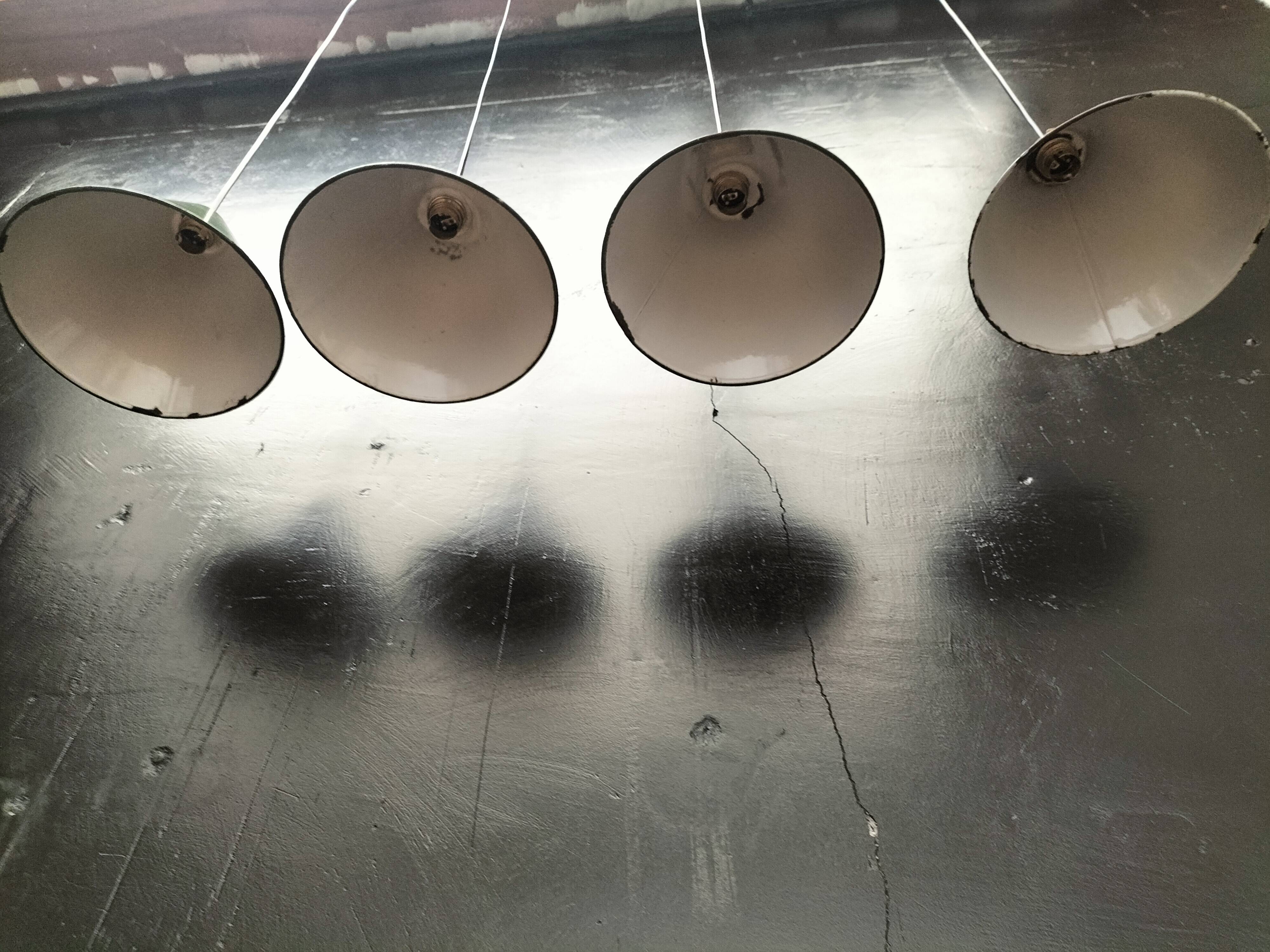 Enamelled sheet metal cone suspensions