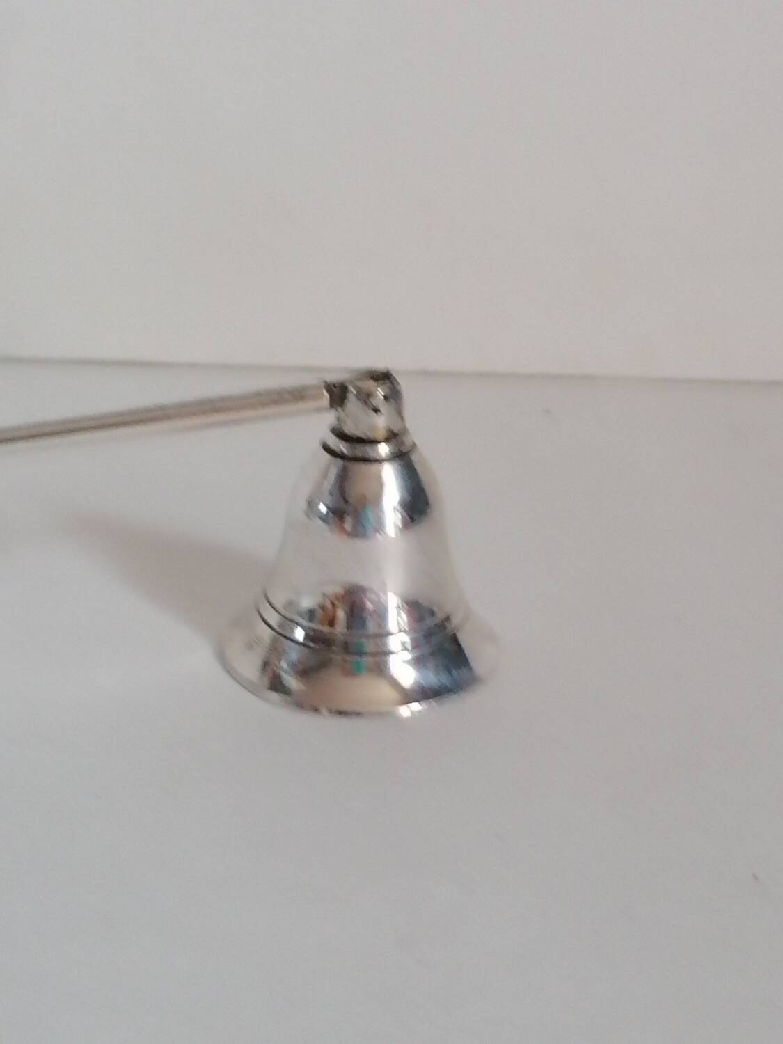 Silver metal candle snuffer