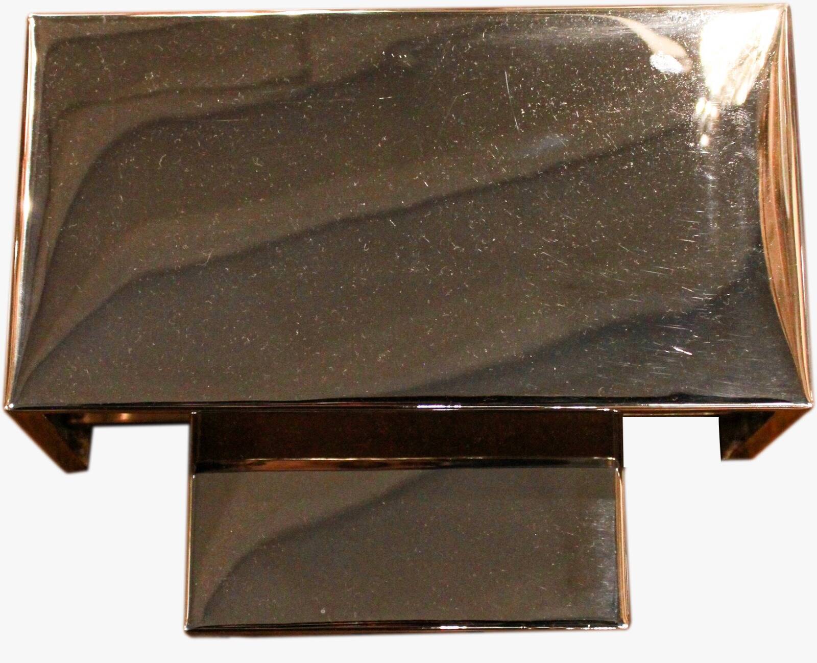 French-origin wall light, made of stainless steel.