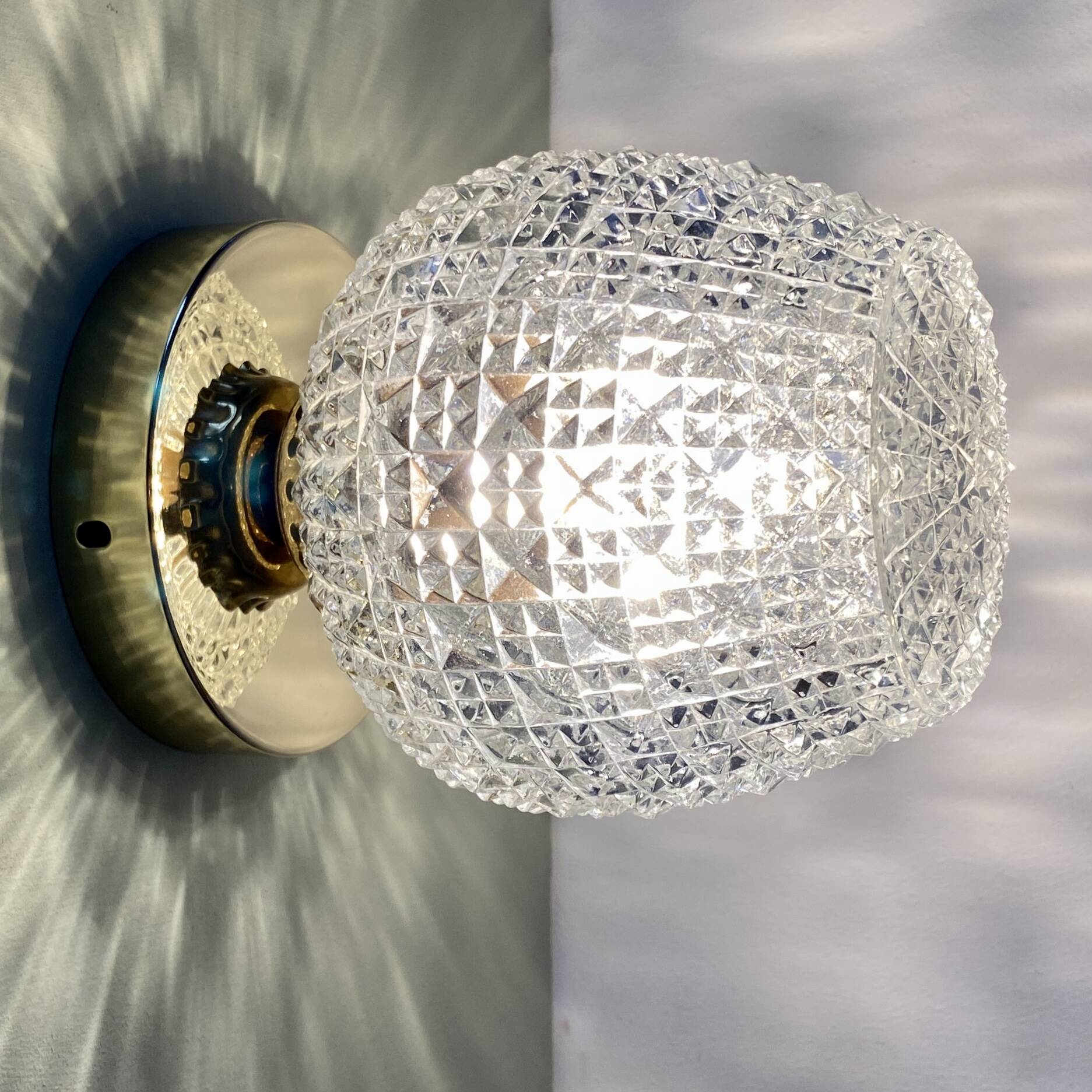 Vintage glass globe wall or ceiling light with diamond point.