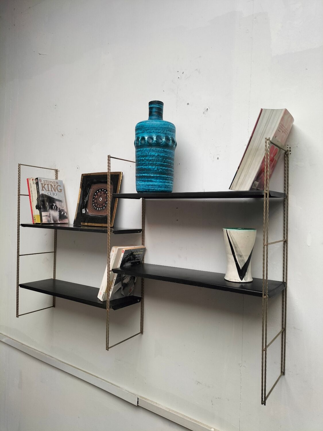 Metal wall shelf