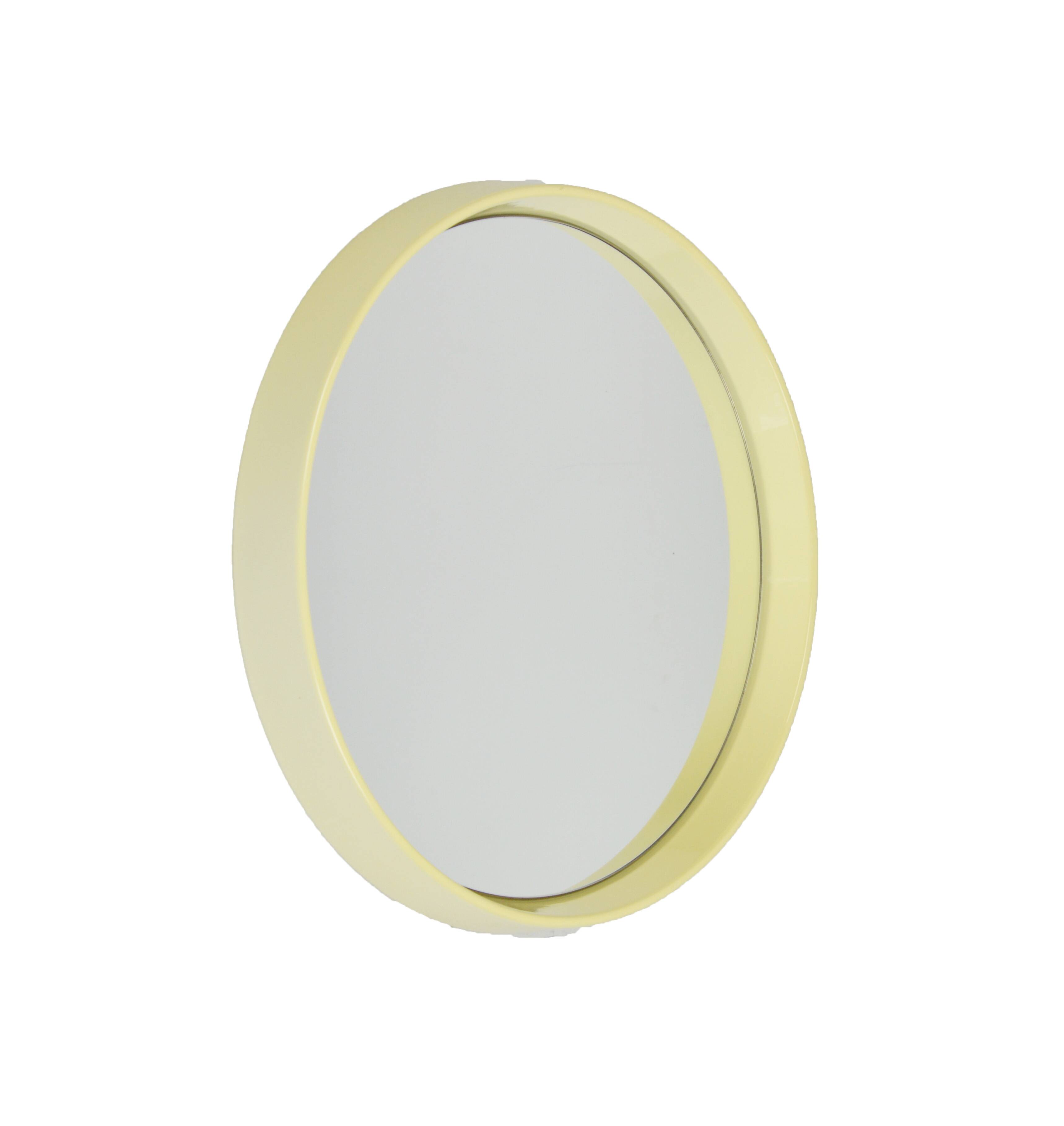 Round mirror in a deep frame, 1970s.