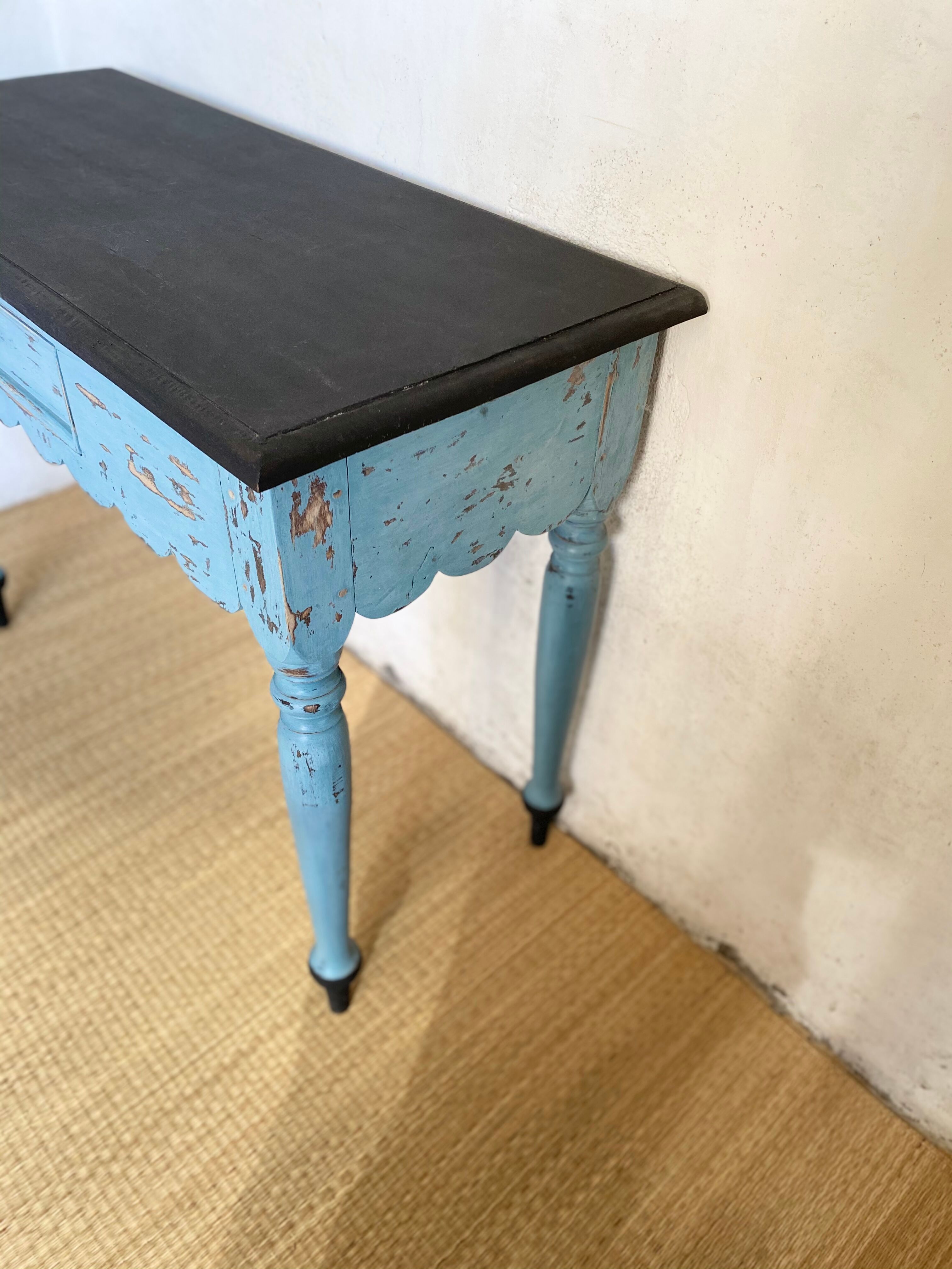Scalloped console table