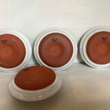 Four ceramic candle holders