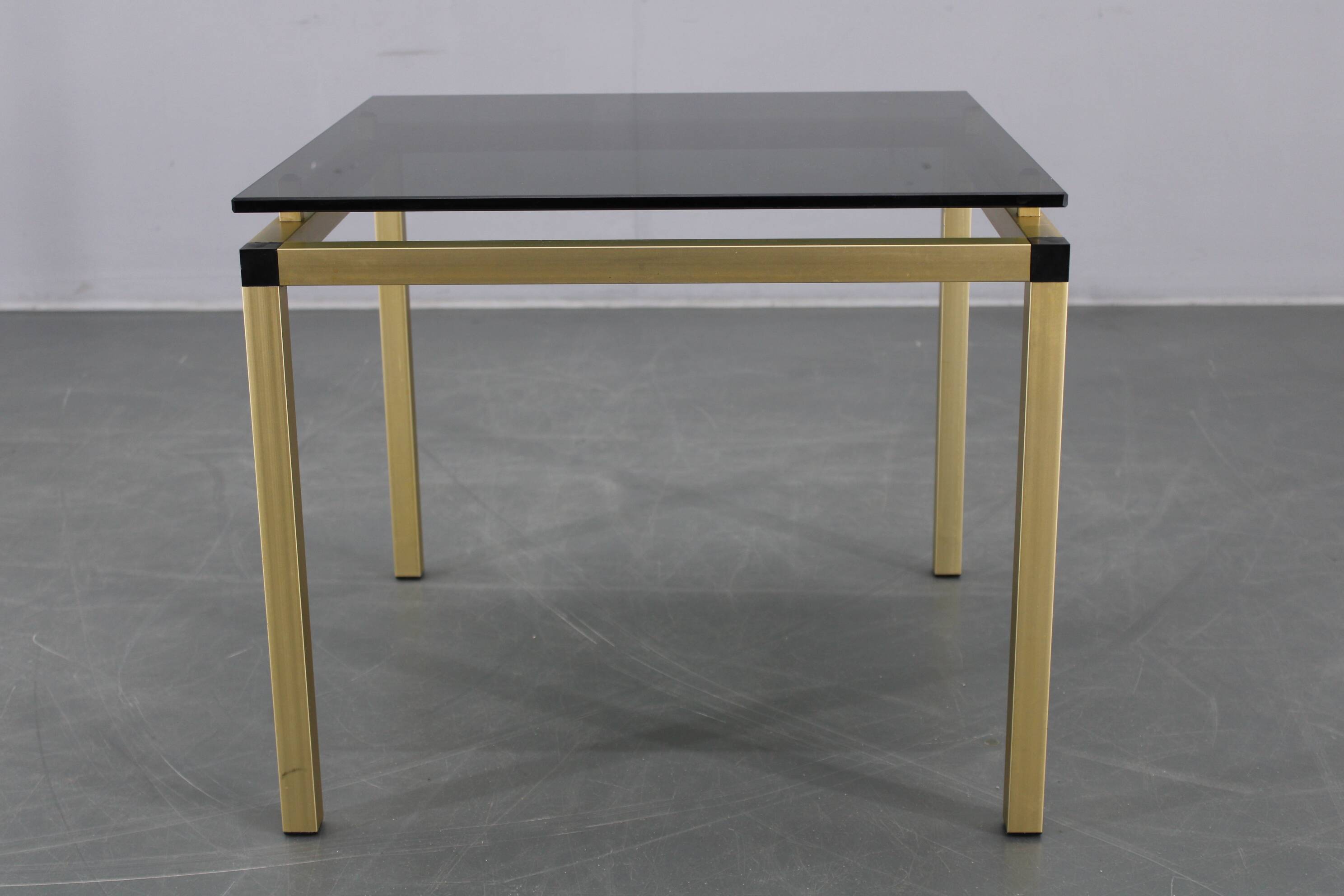 1970s Italian brass finish coffee table with smoked glass top