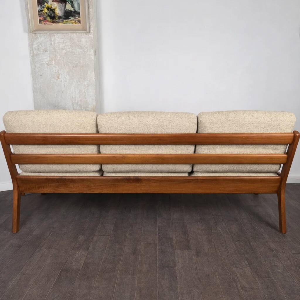 Three-seater sofa in teak and wool model Senator by Ole Wanscher for P. Jeppensen Møbelfabrik, Denmark, 1960.