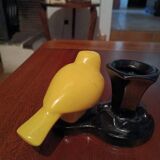 Yellow canary figurine and its candle holder