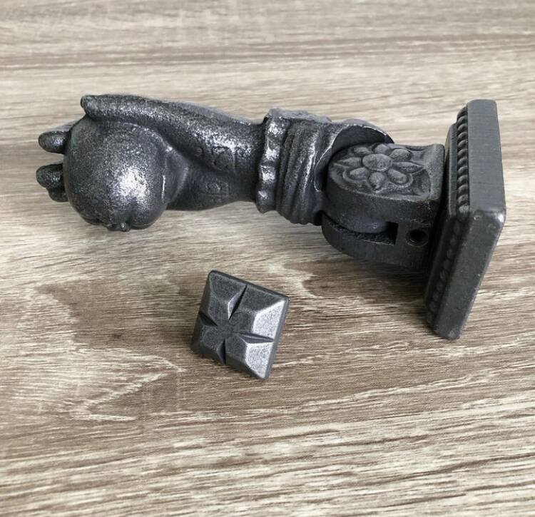 Vintage hand door knocker