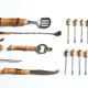 Set of utensils for the aperitif with bamboo handle