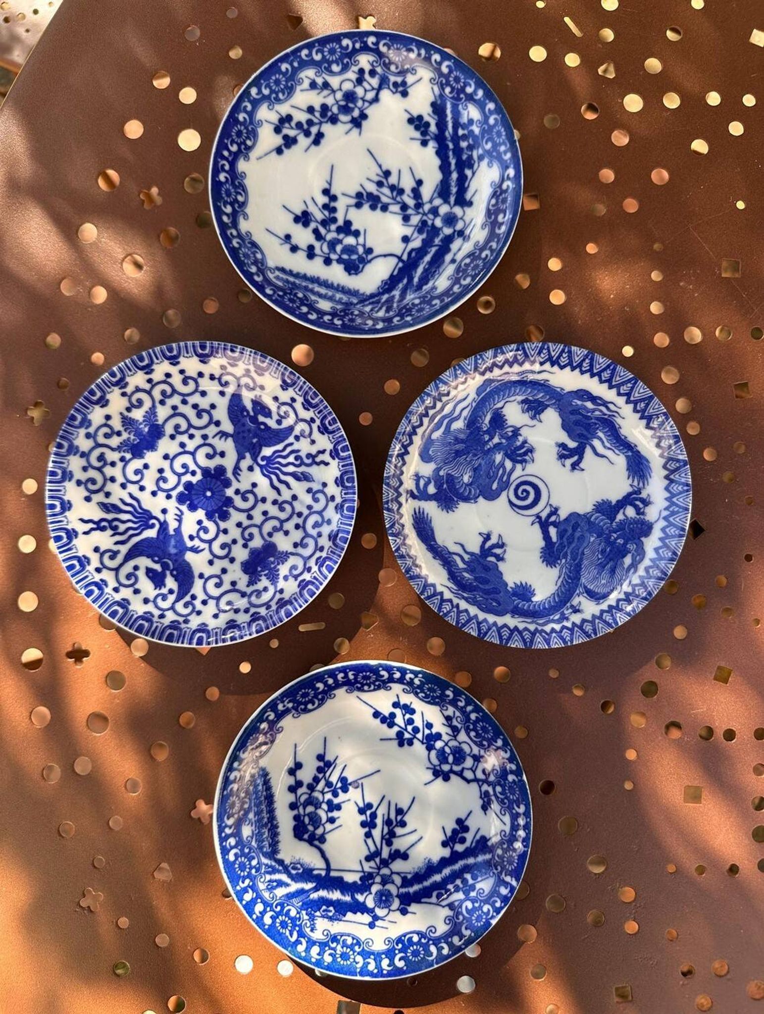 Small vintage plates made in Japan in blue and white porcelain.