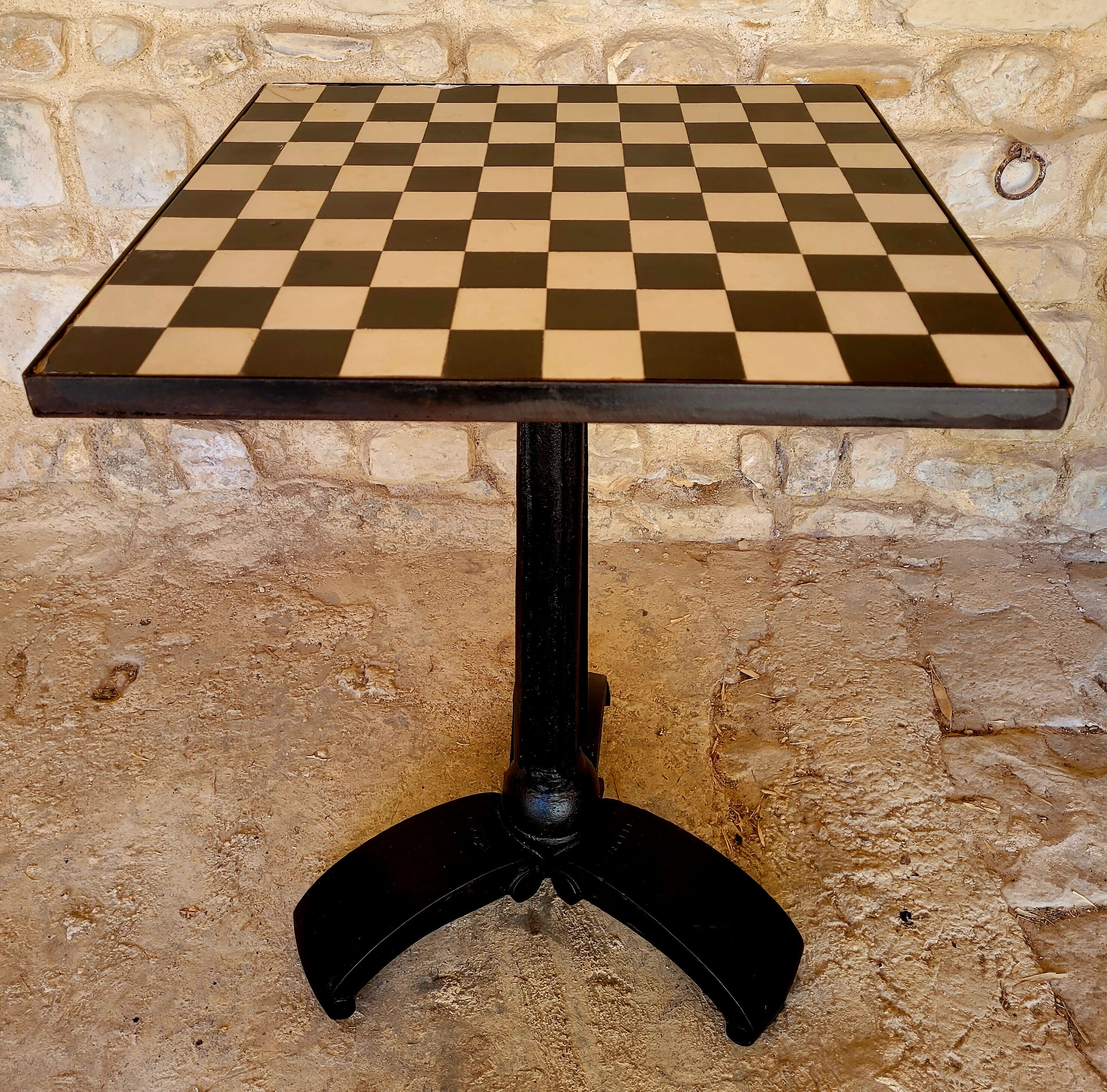 Old vintage bistro table brand Fischel in cast iron