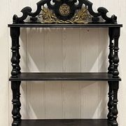 Blackened wooden shelf.