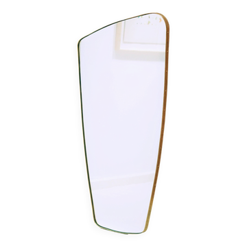 Contemporary rectangular mirror with rounded edges and embossed brass frame.