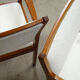 pair of Scandinavian teak armchairs and white buckles