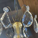 Three-light chandelier in bronze and cut crystal, early 20th century work.