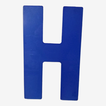 Letter H vintage sign in blue plexiglass