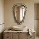 Mid-century modern iron mirror, brutalist, vintage organic, thick sixties.