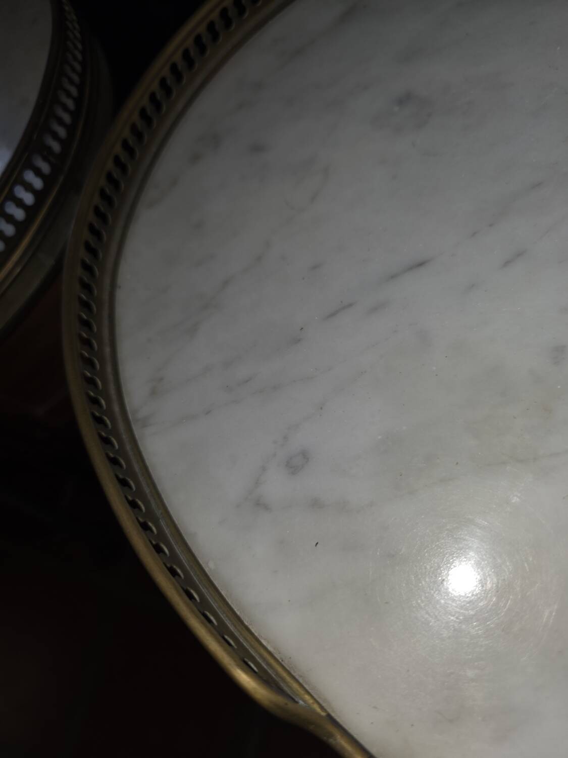 Pair of Louis XVI style bedside tables in mahogany, with marble tops.