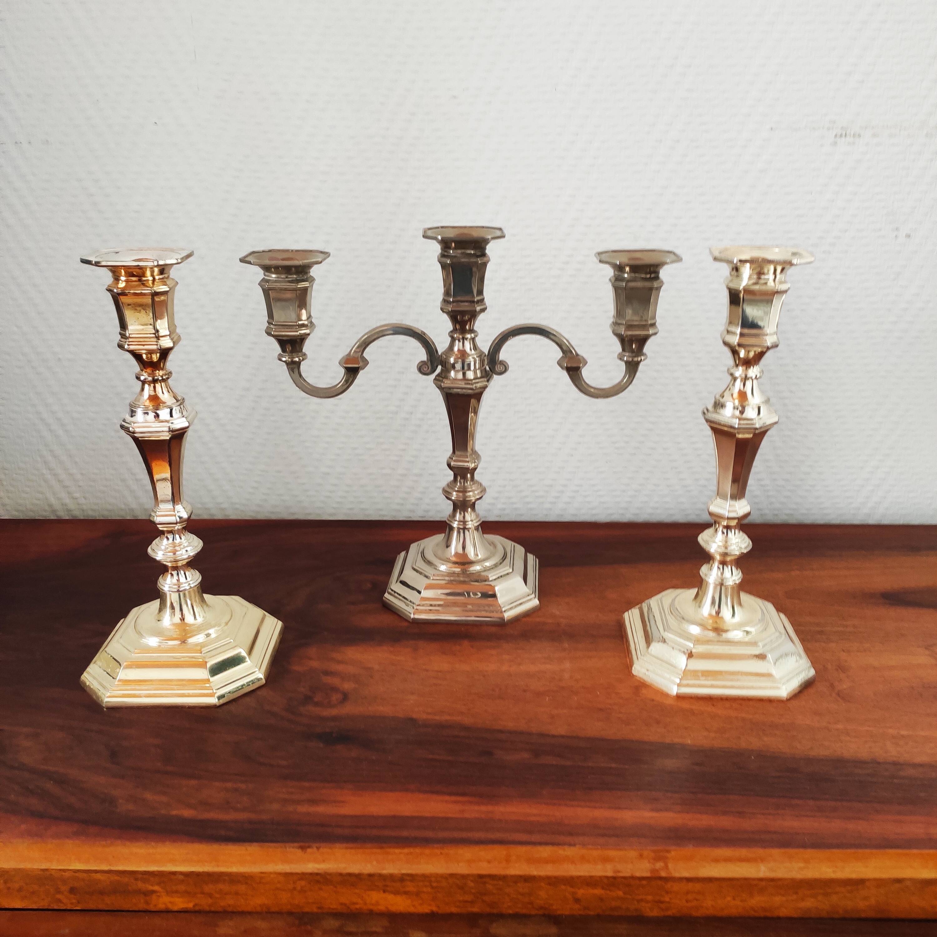 Antique silver-plated metal candlestick and candle holders