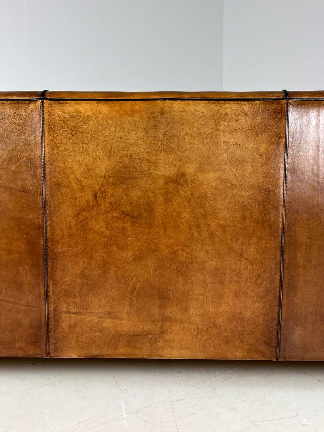 Art deco sofa sheep’s leather