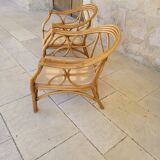 Two large rattan armchairs