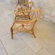 Two large rattan armchairs