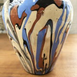 Vase dripping in varnished earth