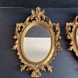 Pair of gilded rococo style mirrors, 1970s