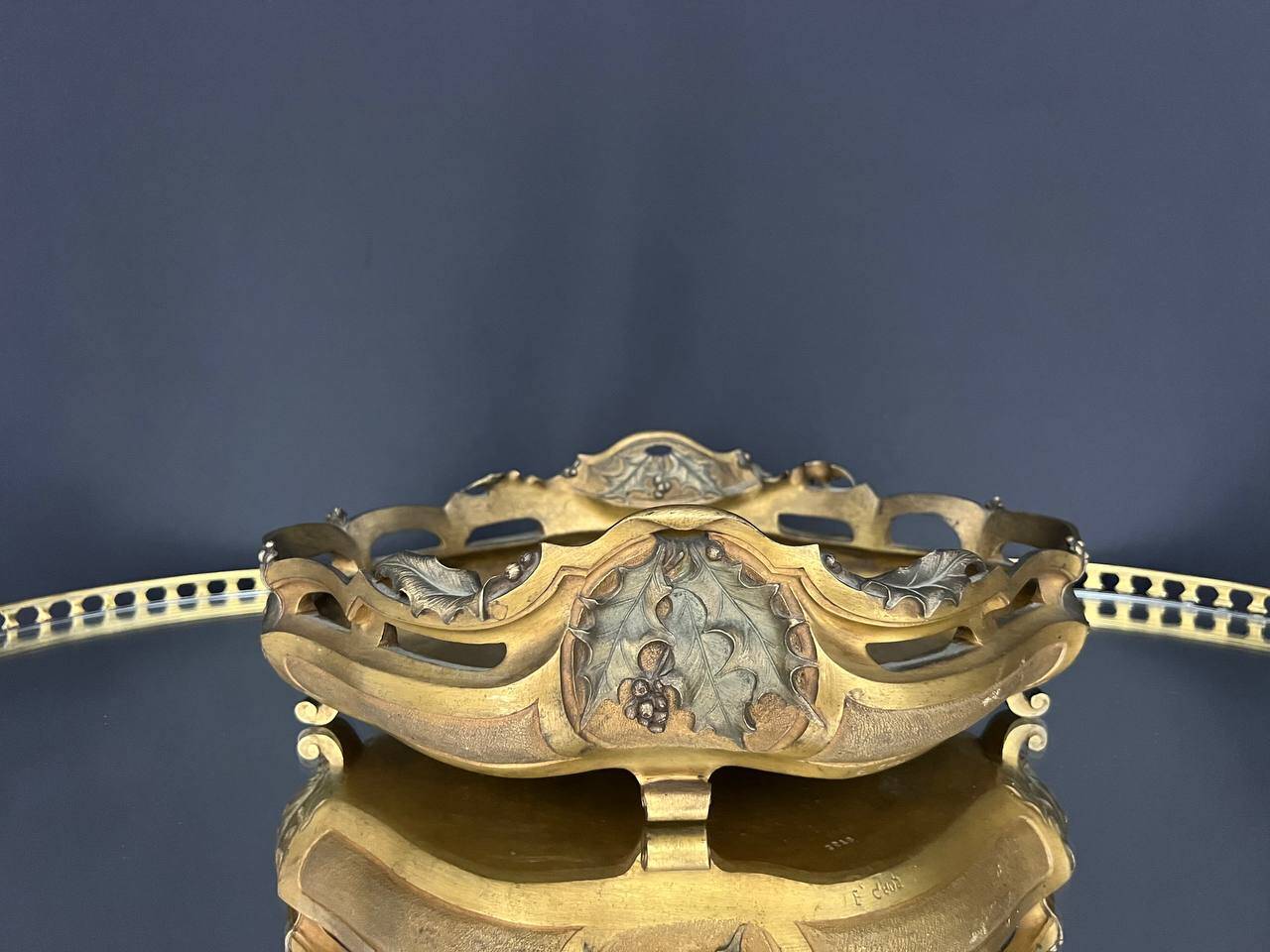 Art Nouveau jardinière in gilded bronze with holly decoration, signed E. Gros.