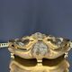 Art Nouveau jardinière in gilded bronze with holly decoration, signed E. Gros.
