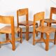 Set of 4 dining chairs in elm wood and cognac leather.