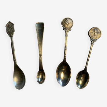 Set of 11 souvenir spoons