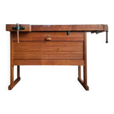 Vintage workbench with vices, antique workshop furniture.