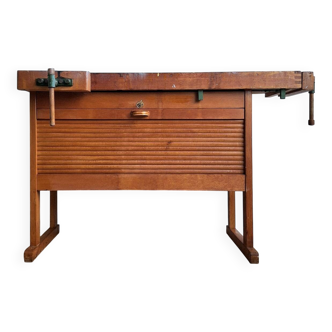 Vintage workbench with vices, antique workshop furniture.
