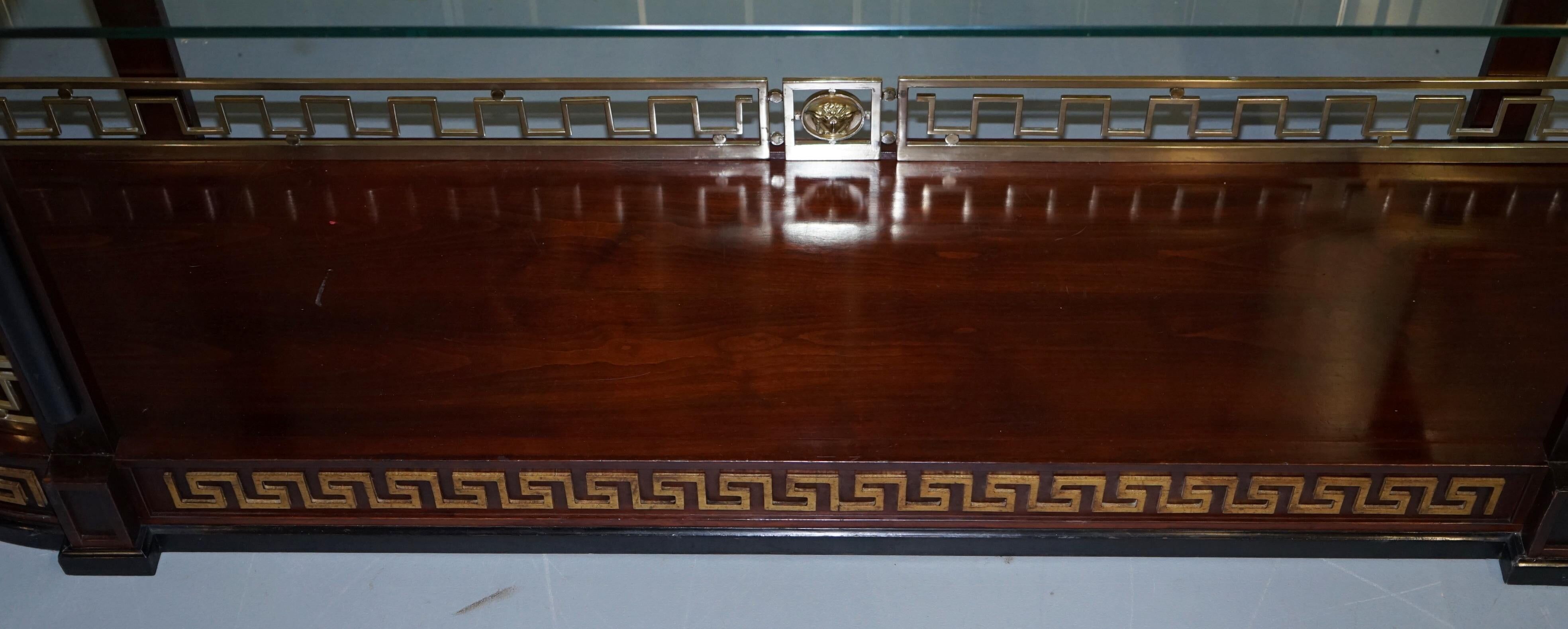 Versace console library in mahogany and brass