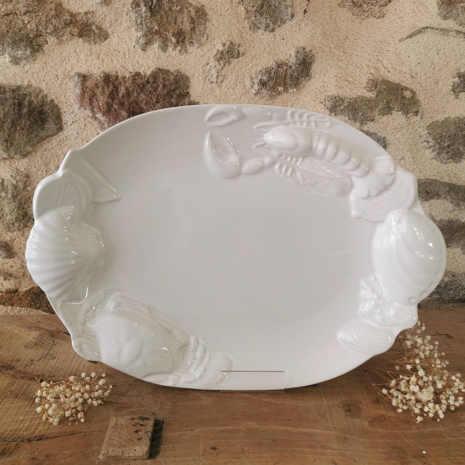 Large white Barbotine shellfish dish