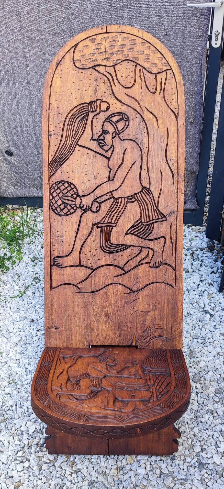 Old African wooden carved talking chair.