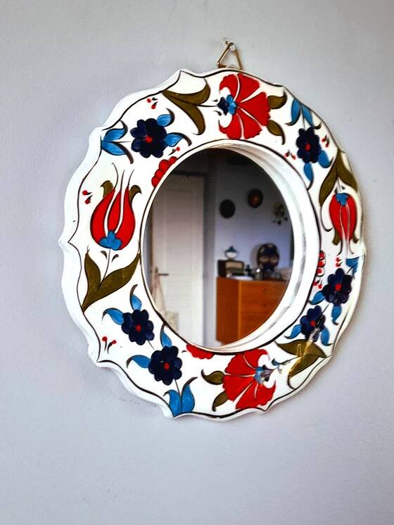 Miroir fleuri en céramique