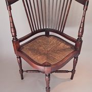 Pair of wicker corner armchairs in mahogany, Jugendstil, 1900.