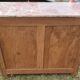Blackened wooden chest of drawers with 5 drawers