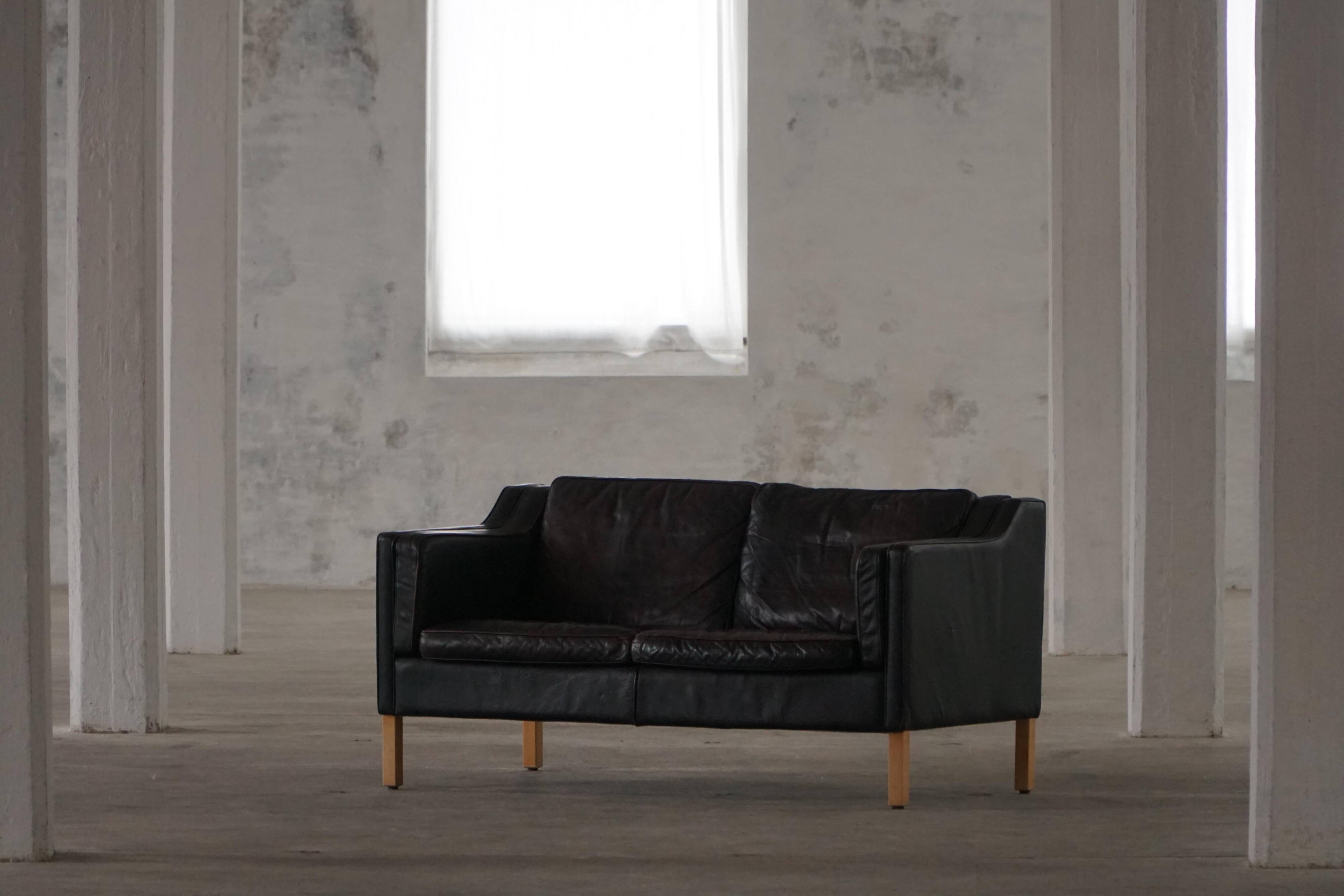 Mogens Hansen, 2-seater canapé mid-century, patinated black leather, 1970s.