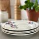 4 assiettes plates 1950
