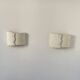Pair of vintage wall lights in smooth plaster and stone imitation, France, 1970.