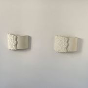 Pair of vintage wall lights in smooth plaster and stone imitation, France, 1970.