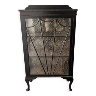 Showcase with a cabinet of curiosities effect