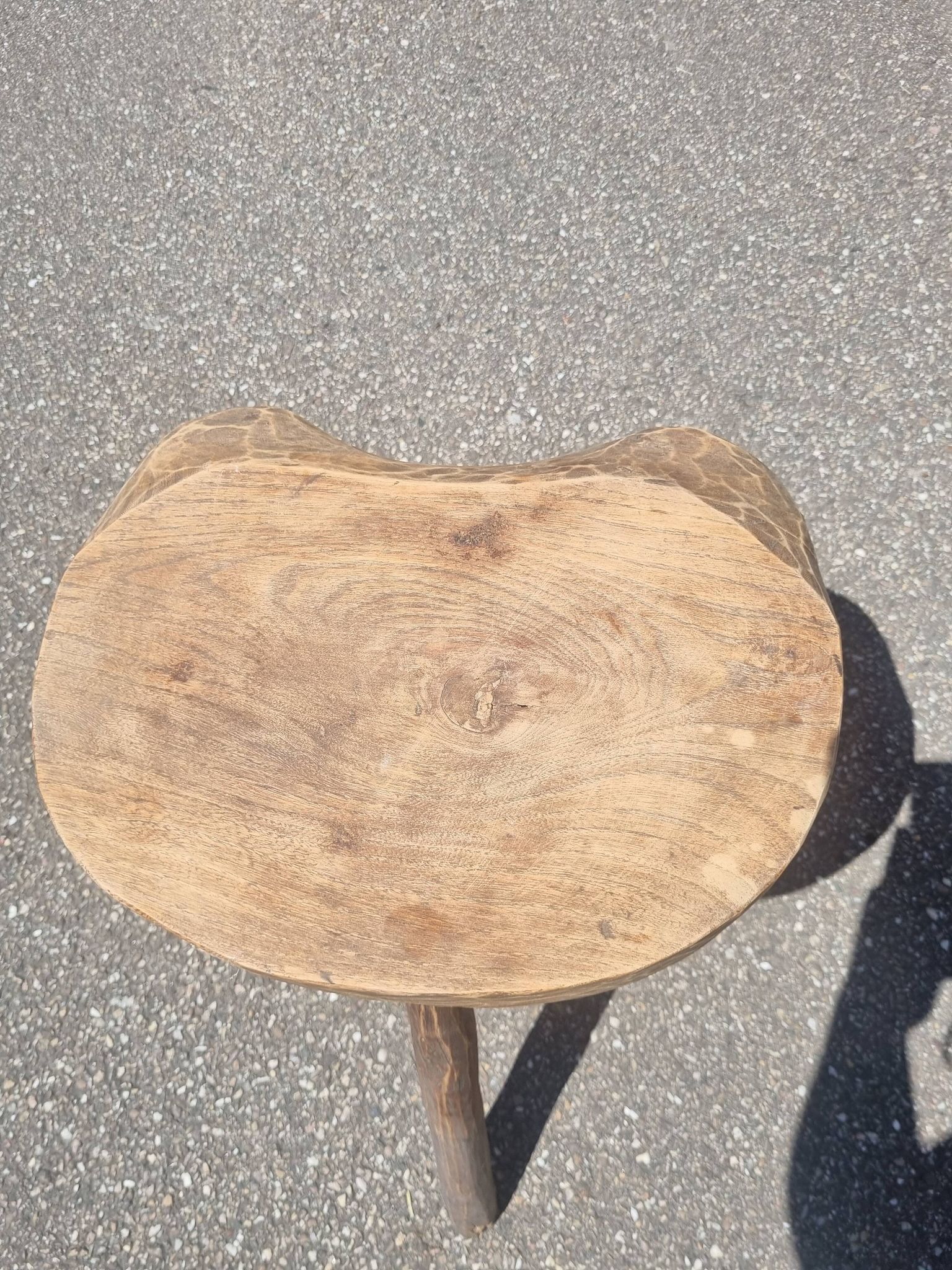 Old wooden tripod stool