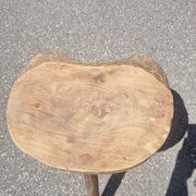 Old wooden tripod stool