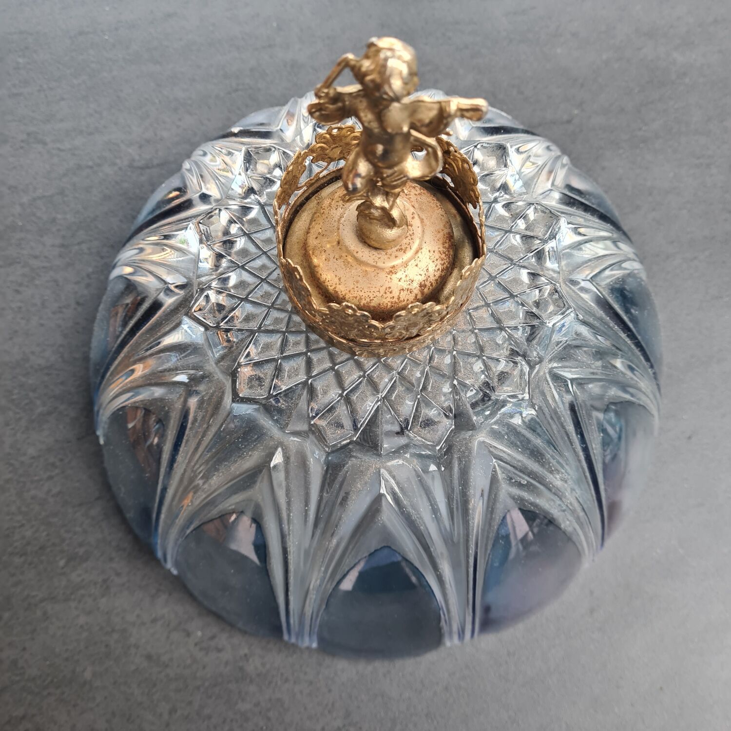 Glass lampshade with brass angel
