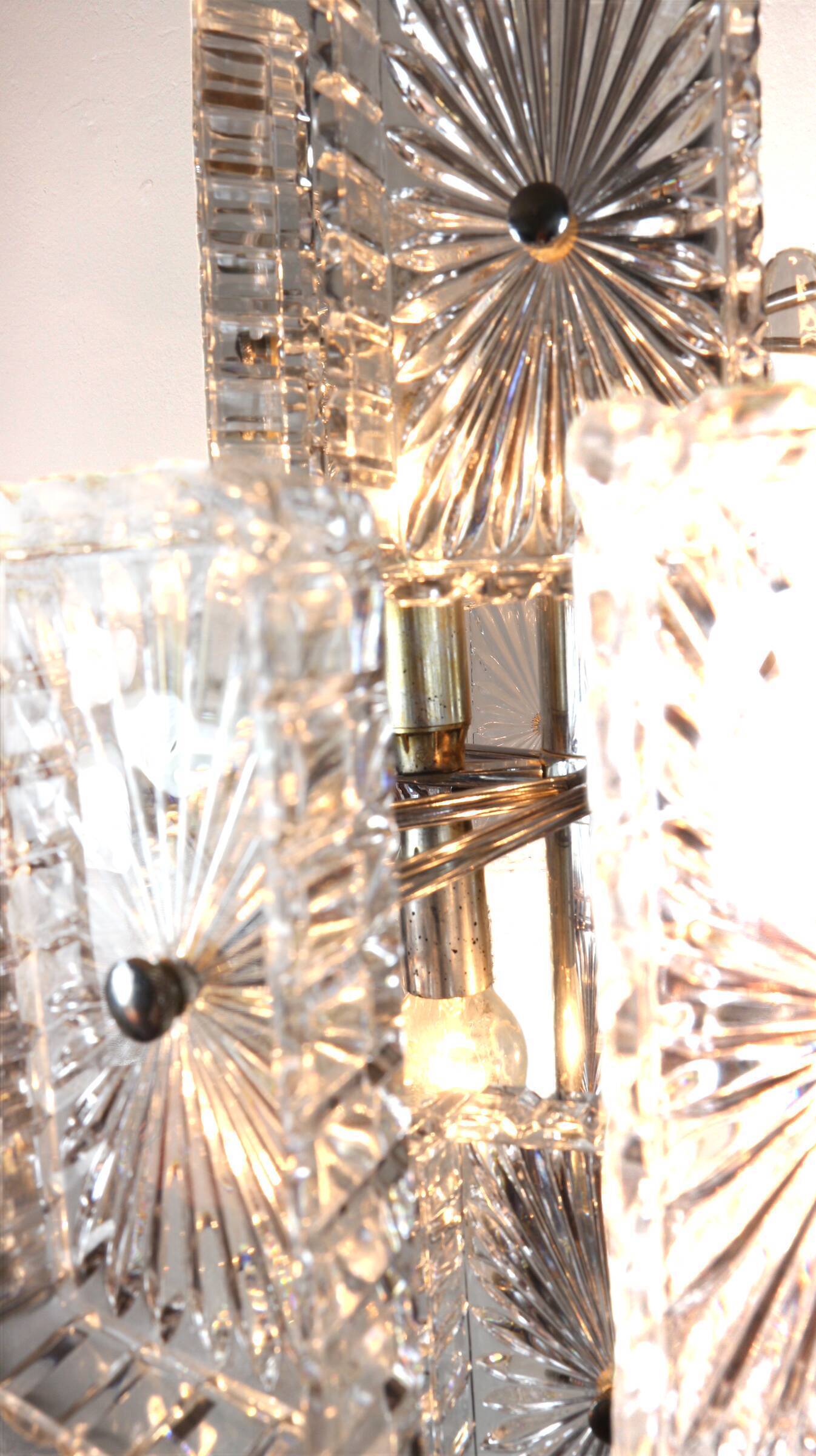 Vintage metal chandelier and carved glass
